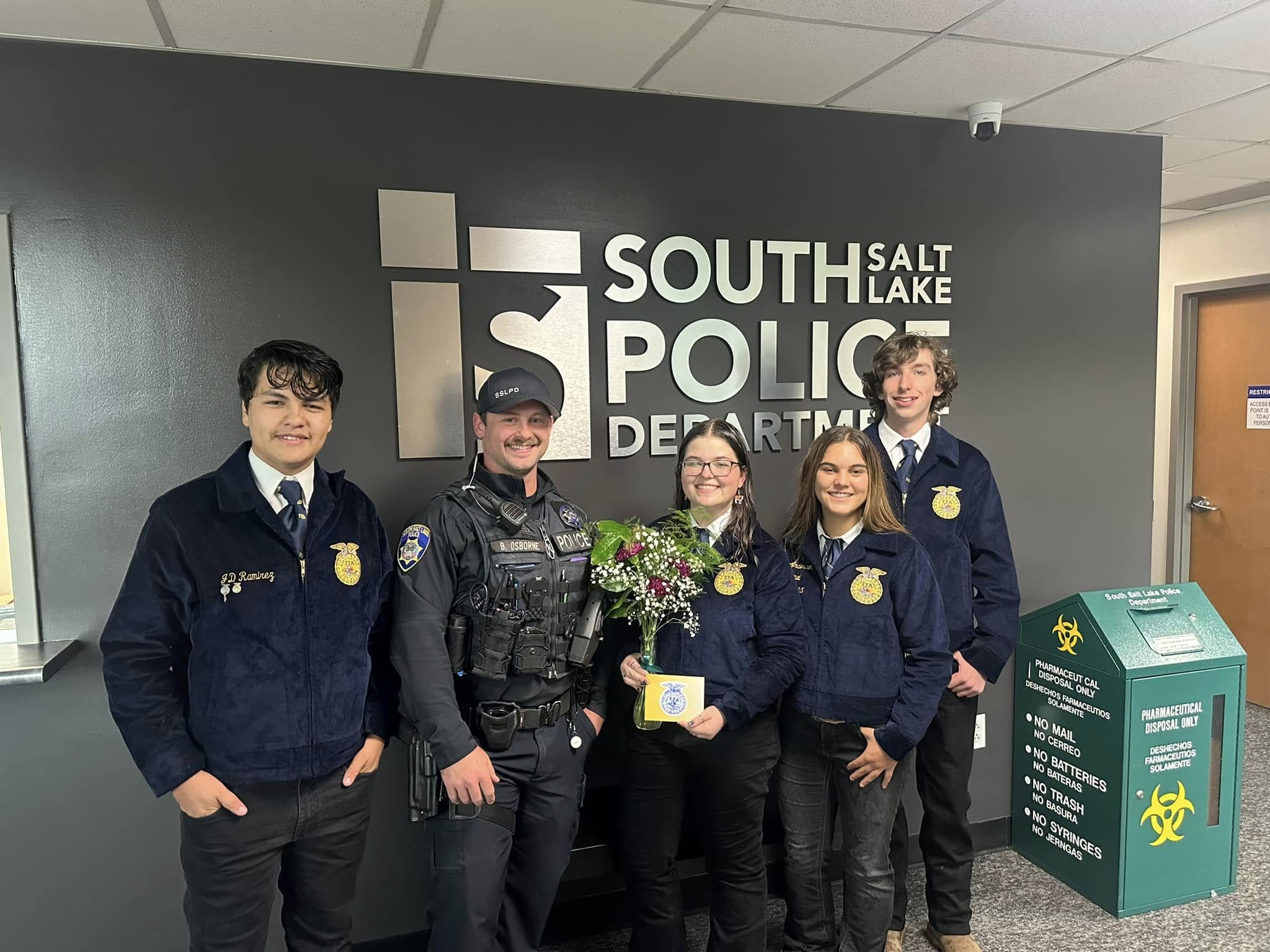 Officers with FFA students